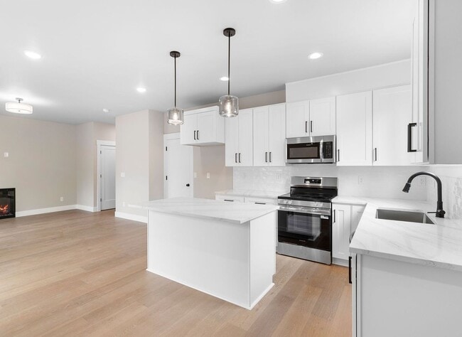 Building Photo - Brand-New 4-Bedroom Home Offering Modern Design, High-End Finishes, Attached Garage & Private Bac...