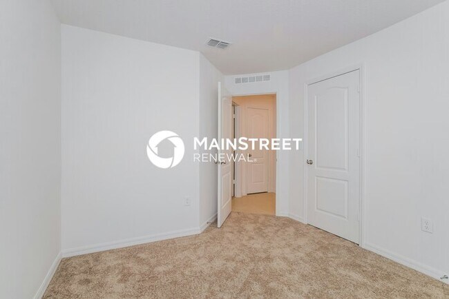 Building Photo - 4 Bedroom Pet-Friendly Home in Mascotte, FL with Main Street Renewal