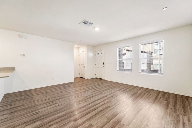 Building Photo - Modern West Henderson Townhome with Sleek Upgrades & Smart Home Features!