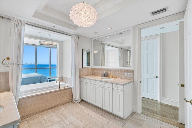 Building Photo - 10295 Collins Ave