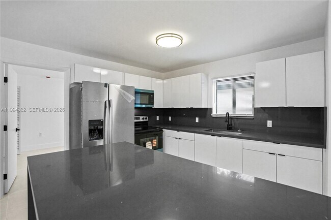 Building Photo - 5823 NW 30th Ave