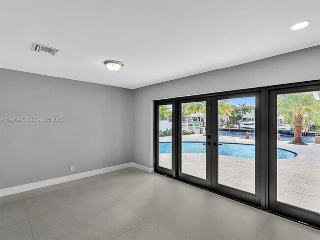 Building Photo - 2310 NE 48th Ct