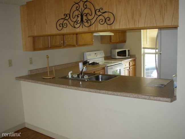 Building Photo - 2 br, 1.5 bath Condo - 4620 Pontchartrain Dr