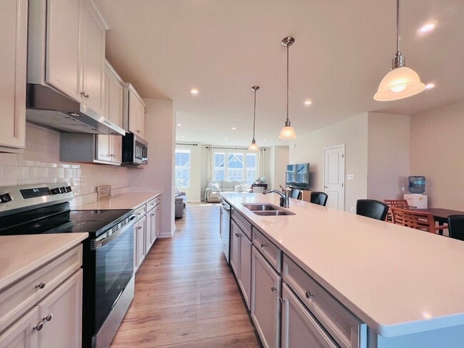 Building Photo - MINUTES TO VRE AND ALL THE CONVENIENCES OF...