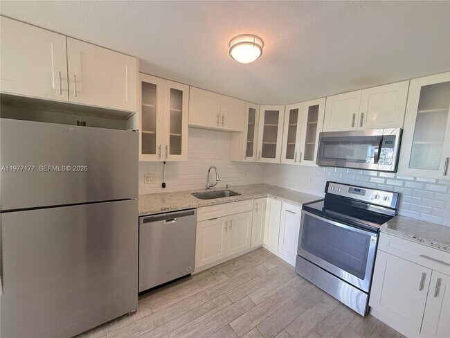 Building Photo - 5750 Collins Ave