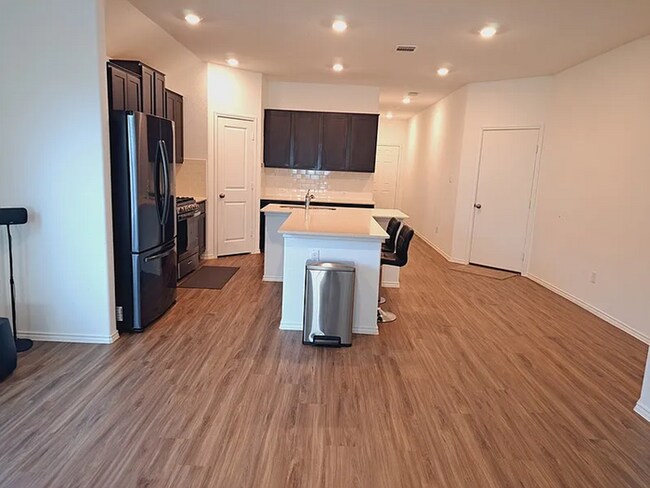 Building Photo - COMING SOON! Beautiful 4BR 3BA w/ Fenced Backyard • Private Yard• Attached Garage in Siena