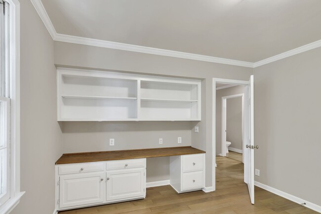 Built-in desk and shelving. Great for office or hobby room. - 153B Woodmont Blvd