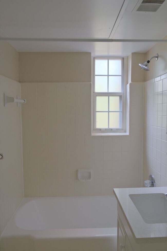 Building Photo - Beautiful corner unit in a secure, all-brick, pet-friendly building