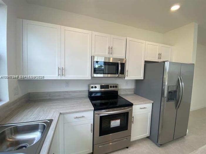 Building Photo - 575 NE 208th Ter