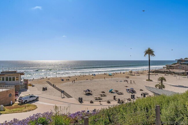 Building Photo - THE BEACH IS YOUR BACKYARD! Light & Bright...