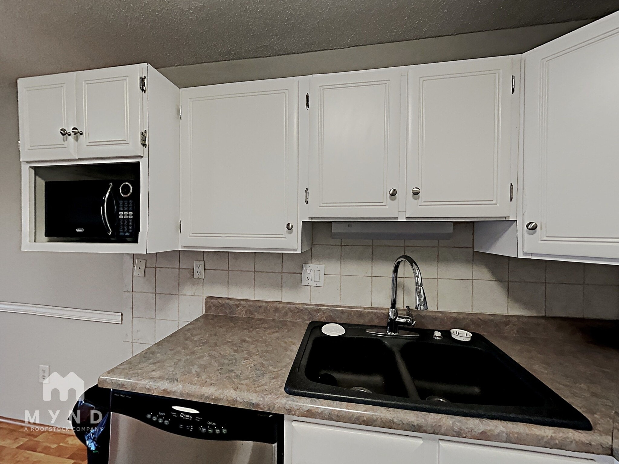 Building Photo - 7020 E Girard Ave