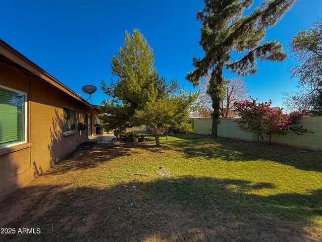 Building Photo - 8616 N 40th Dr