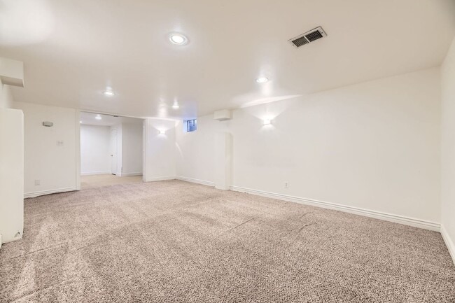 Building Photo - Spacious Home w/Large Backyard Only Blocks...