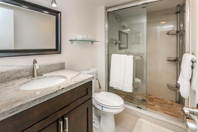 Building Photo - 3675 N Country Club Dr