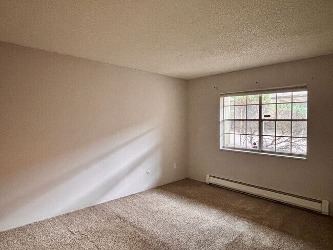 Building Photo - Spacious 2-Bedroom Condo in Denver's Monaco Lakes Community | $1,295/mo