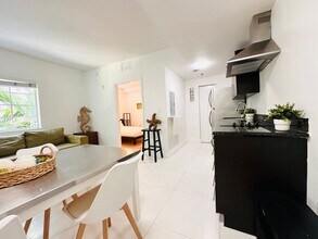 Building Photo - Bright and furnished 1/1 in classy remodel...
