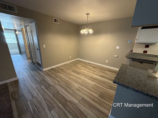 Building Photo - Spacious 3-Bedroom Condo with In-Unit Laundry – Convenient Aurora Location