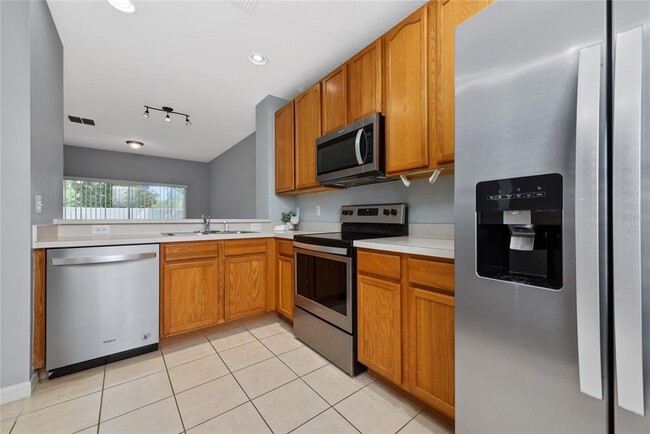 Building Photo - 9313 Jasmine Flower Ln