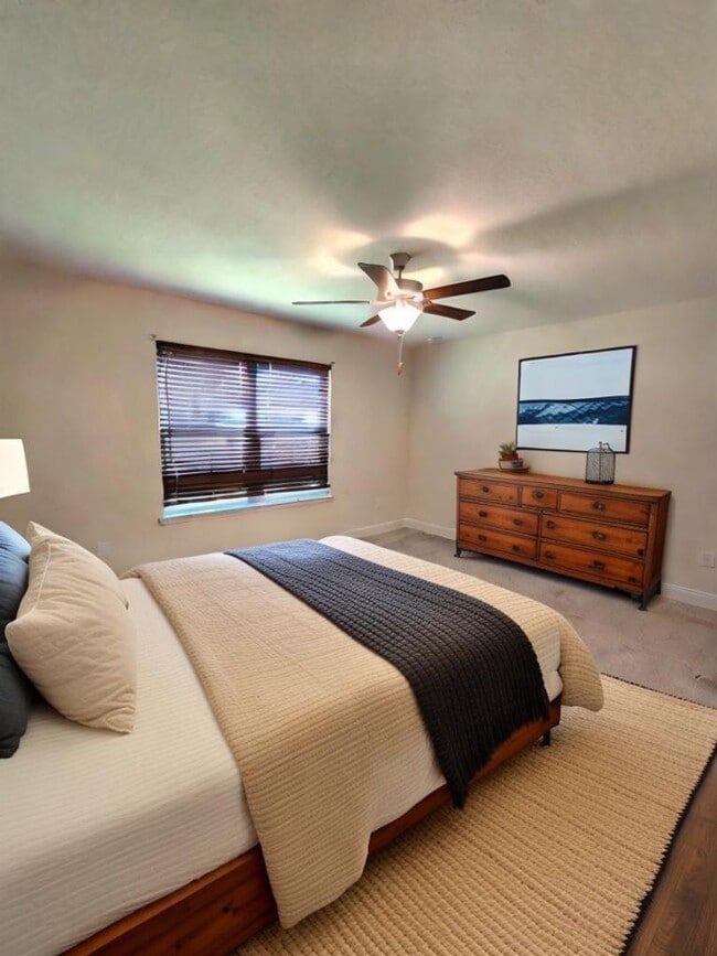 Building Photo - Welcome to this stunning 4-bedroom, 3-bath...