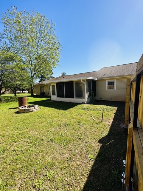 Back of house with screened in patio - 101 Williams Dr