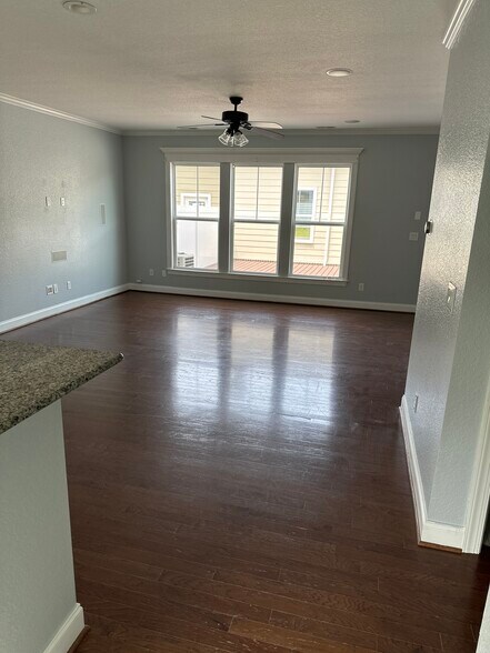 View from kitchen in to living room. - 611 Veery St