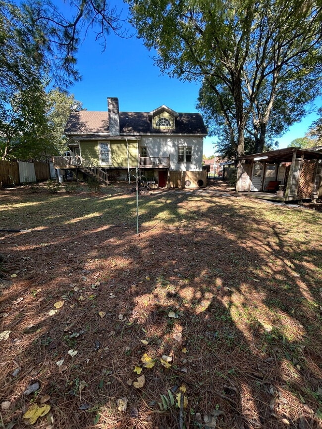 Building Photo - "Charming 4-Bedroom Retreat with Granite F...