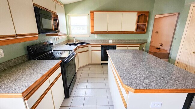 Building Photo - 311 W Sabal Palm Pl