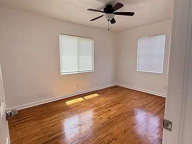 Building Photo - Charming Centrally Located Home | Wood Floors + Fenced Yard