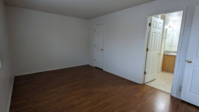 Building Photo - RANCH 3 BED/3 BATH PATIO HOME WITH MAIN FL...