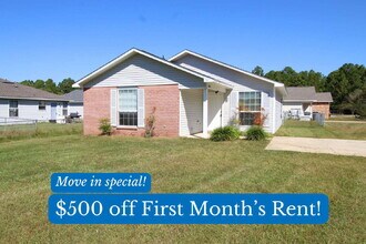 Building Photo - Move in special! 3/2 patio home with spaci...
