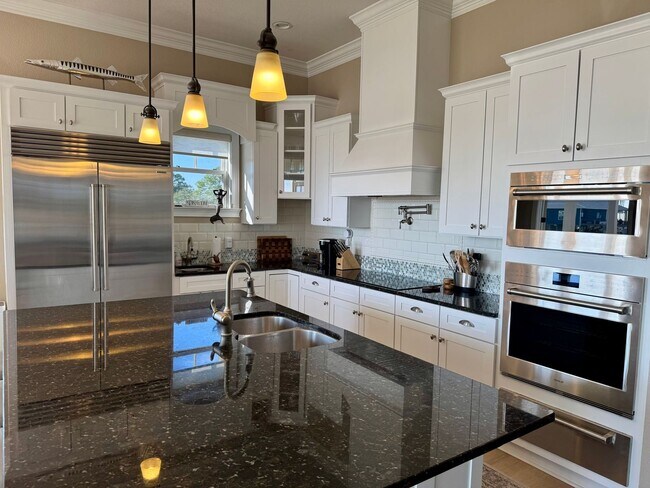 Building Photo - Waterfront Shell Point Home with Dock, Hot Tub, Elevator, & Golf Cart