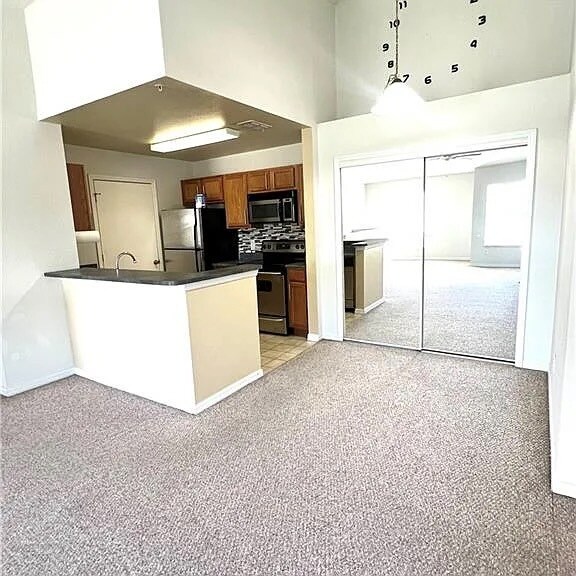 Kitchen View with breakfast bar - 14870 Pleasant Bay Ln