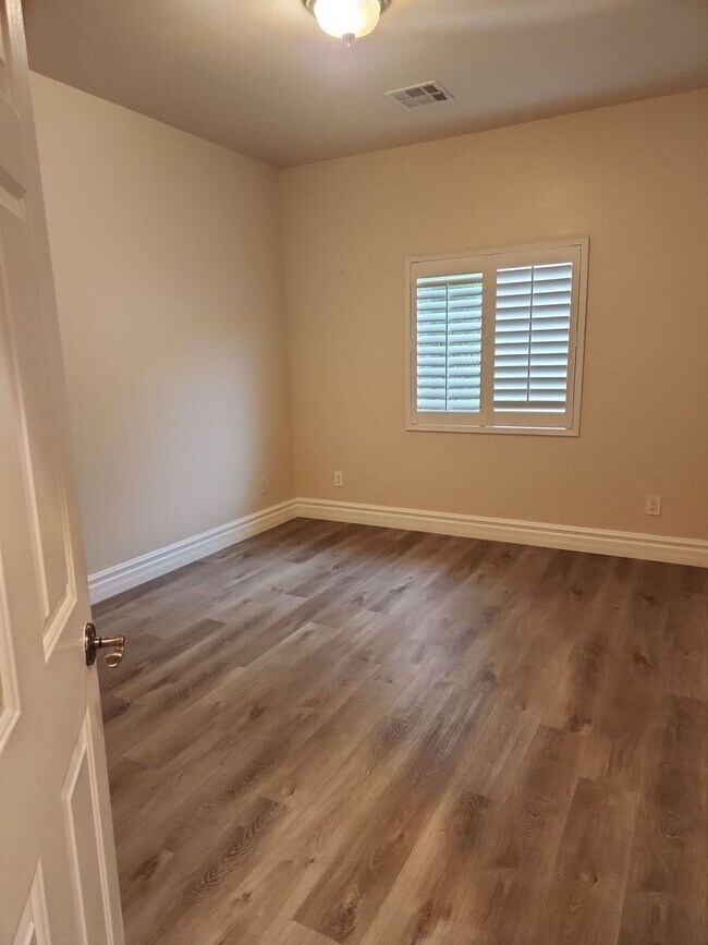 Building Photo - A Stunning 4 Bedroom Home with a Sparkling Pool