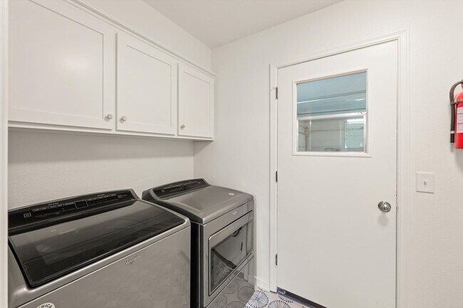 Building Photo - Modern Details and Interiors to a sought-a...
