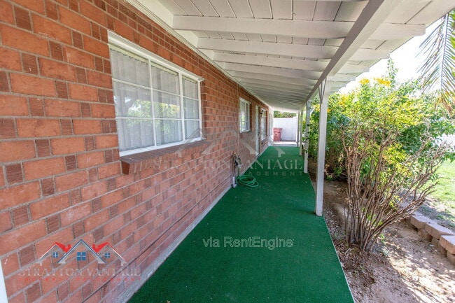 Building Photo - 8119 E Amelia Ave