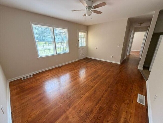 Building Photo - Three bedroom brick home available now!
