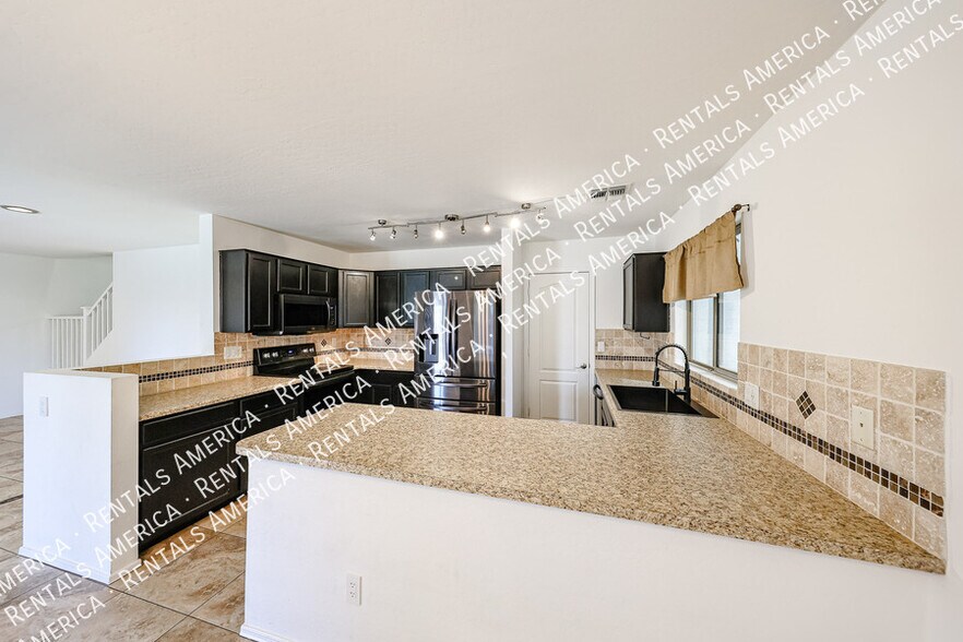 Building Photo - 13041 W Mauna Loa Ln
