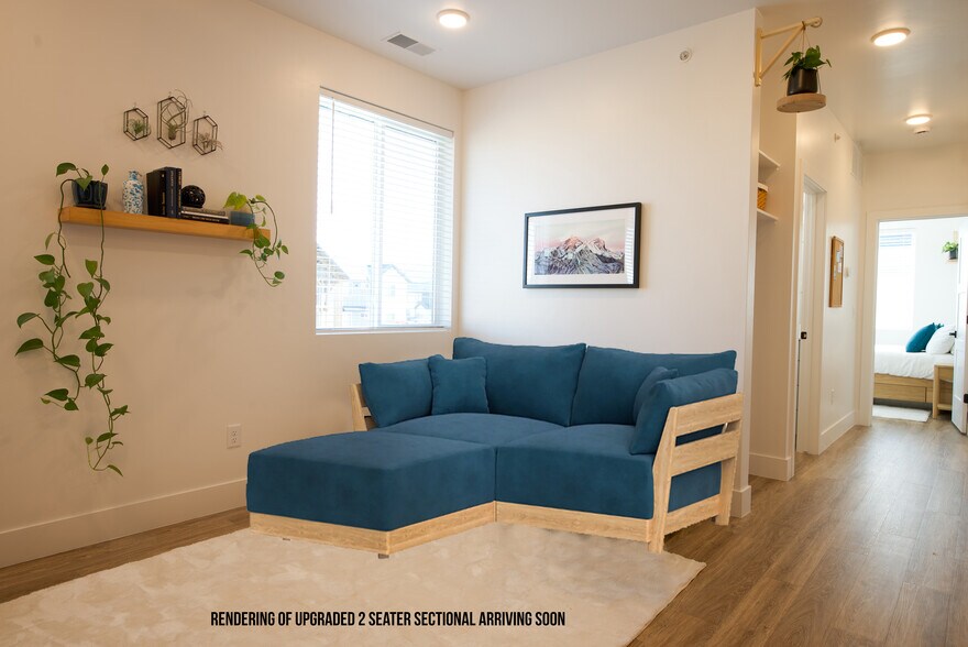 Living room with the upgraded couch arriving soon - 525 N 1st St