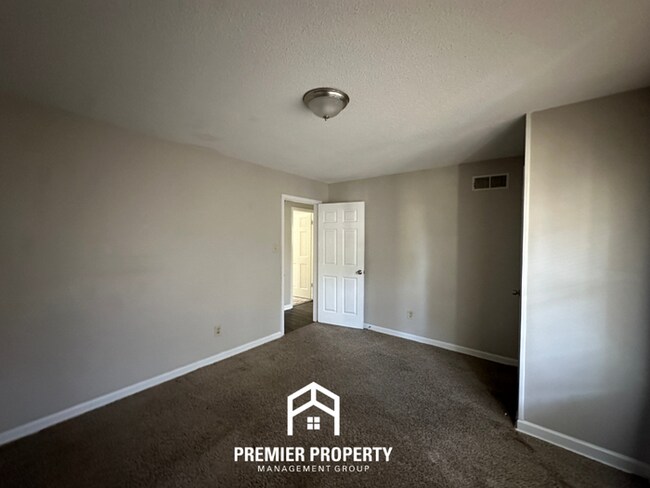 Building Photo - Gorgeous 4BR/2BA Bartlett Home with Brick Fireplace & Spacious Fenced Yard!