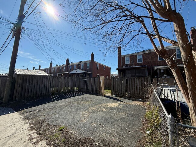 Building Photo - End Unit 3BR Townhome in Dundalk | Covered Porch, Fenced Yard, Central A/C + Off Street Parking