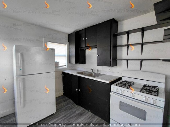 Building Photo - Fully Renovated Home with Spacious Yard – Move-In Ready!