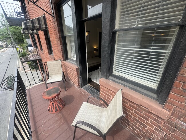 Balcony overlooking the road. - 339 Whitaker St