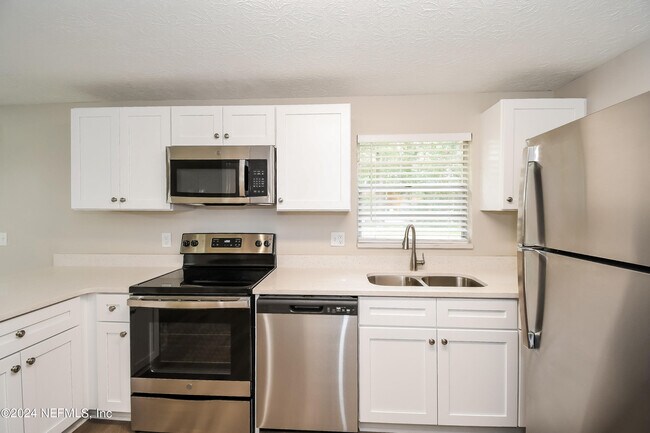 Building Photo - 8326 Santman Ct