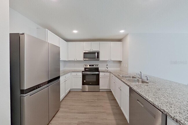 Building Photo - 8590 SW 44th Ct