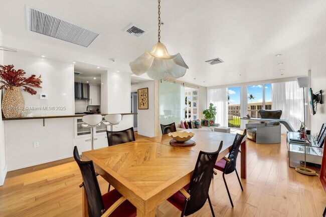 Building Photo - 10275 Collins Ave