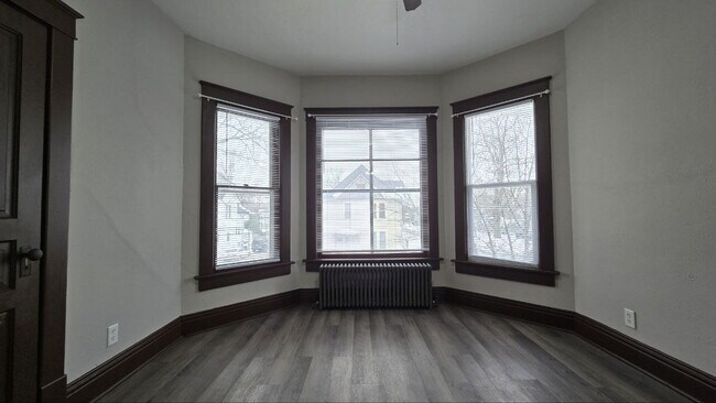 Building Photo - Spacious 3BR/1BA First-Floor Home with Garage & Fenced Yard in Quiet Michigan City Neighborhood