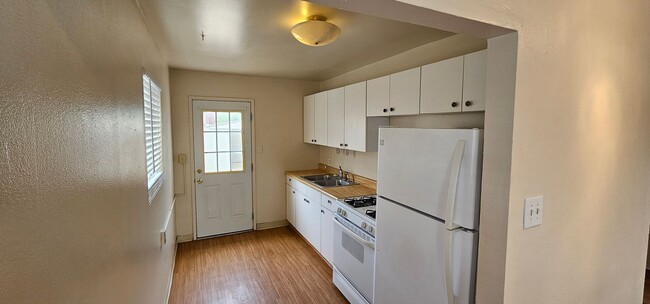 Building Photo - Live Large in a Cozy Retreat! Private Back...