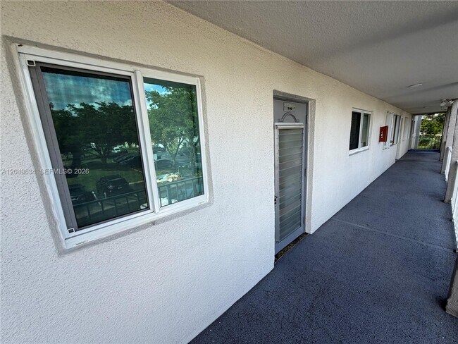 Building Photo - 8135 Sunrise Lakes Blvd
