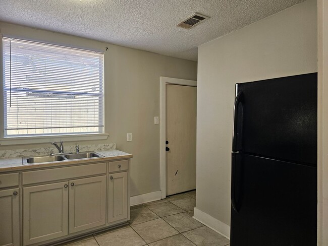 Building Photo - Available Now!