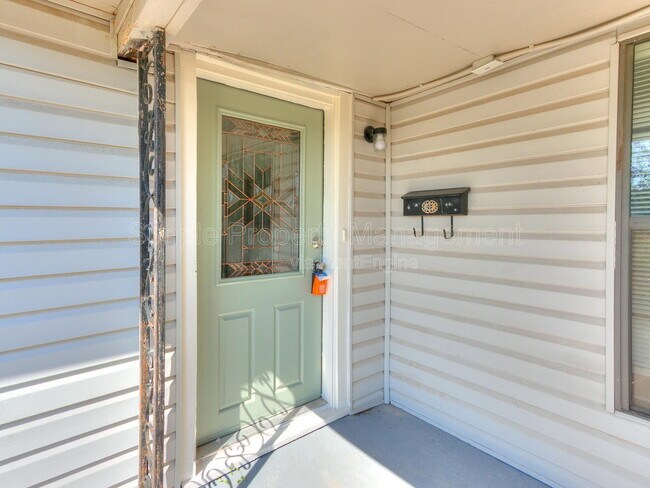 Building Photo - 9706 N Garnett Dr